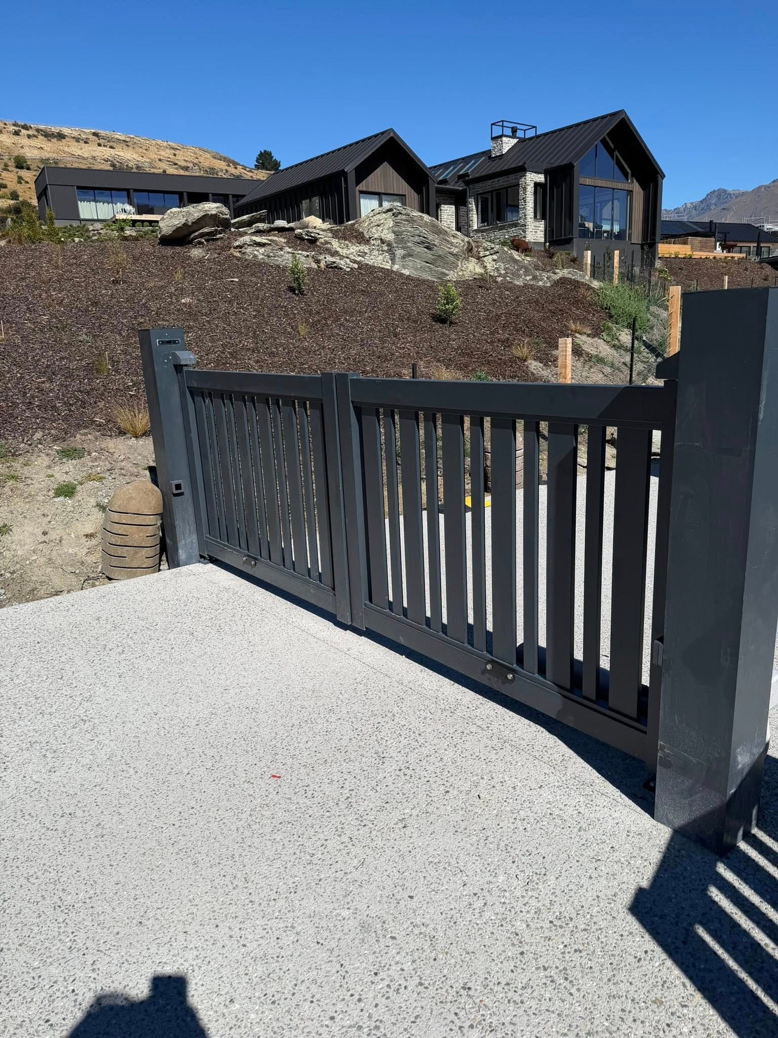 Automatic swing gate on a residential driveway, Queenstown