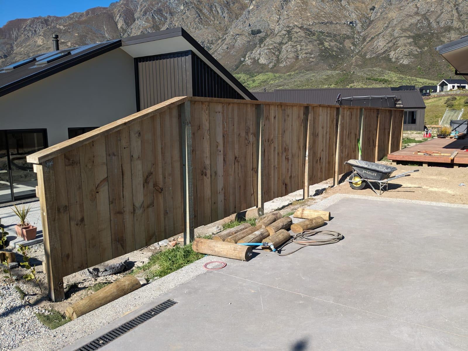 Pine paling corner fence with The Remarkables behind, Queenstown